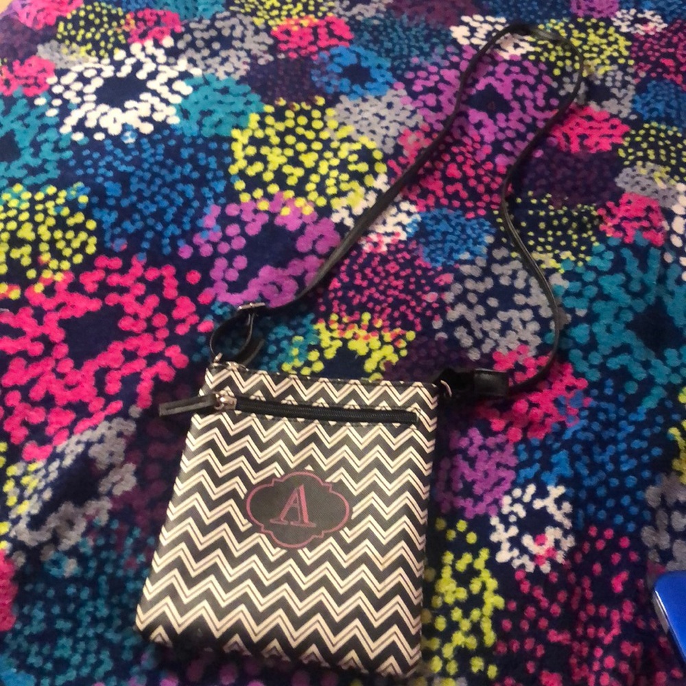 Crossbody bag with an A on it